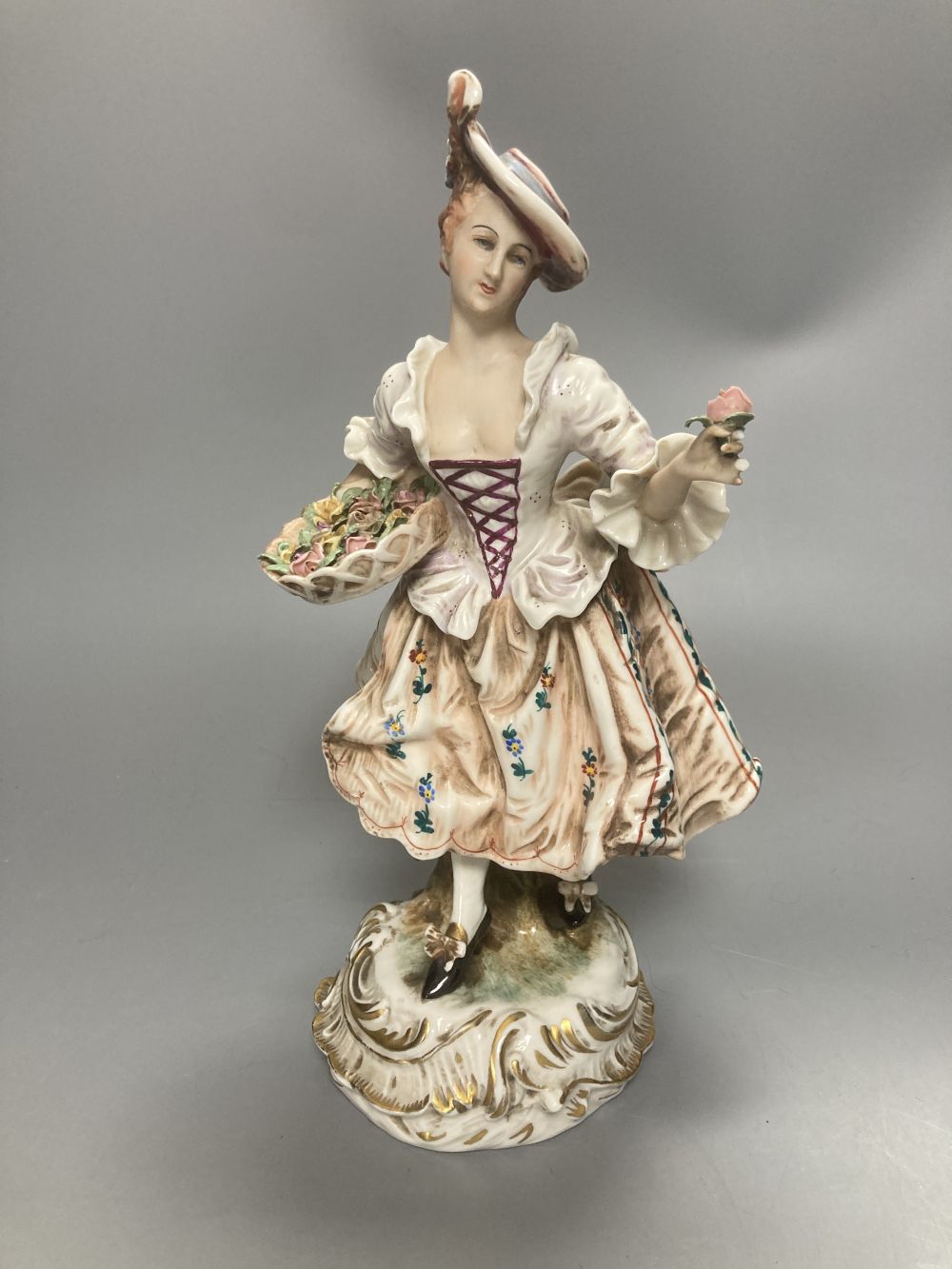 A pair of Wessel Frankenthal figures, 26cm, and a French bisque gallant, 29cm